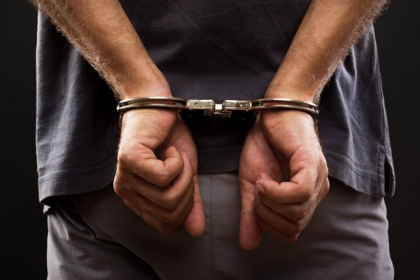 depositphotos_28098513-stock-photo-close-up-arrested-man-handcuffed.jpg