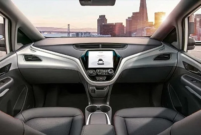 GM показала автомобиль без руля и педалей, который ездит сам